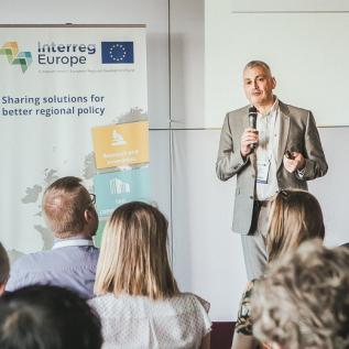 What is Interreg Europe 7 Erwin Siweris, director of Interreg Europe giving a presentation at an Interreg Europe project seminar in Sofia