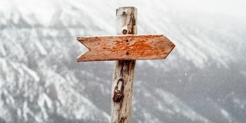 Brown wooden arrow sign Brown wooden arrow sign