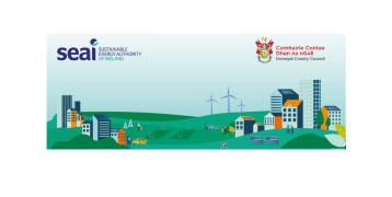 SEAI Sustainable Energy Communities Programme Green fields, buildings, wind turbines