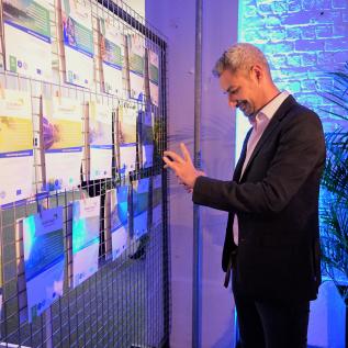 Person taking a picture of projects ideas Person taking a picture of projects ideas